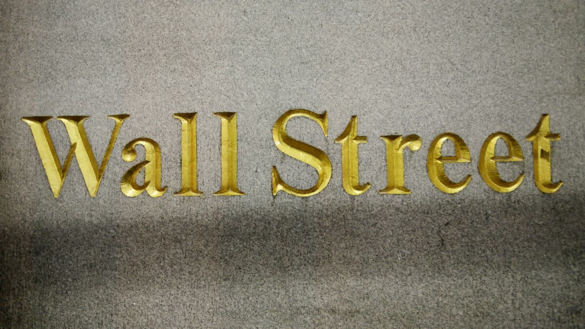 Wall Street mostly higher after cooler-than-expected inflation data, IBM shares tumble 25%