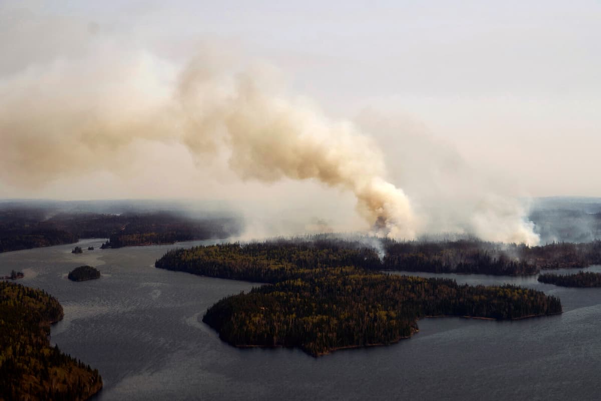 Forest Fire Threatens Flin Flon Canada Residents Ordered to Evacuate