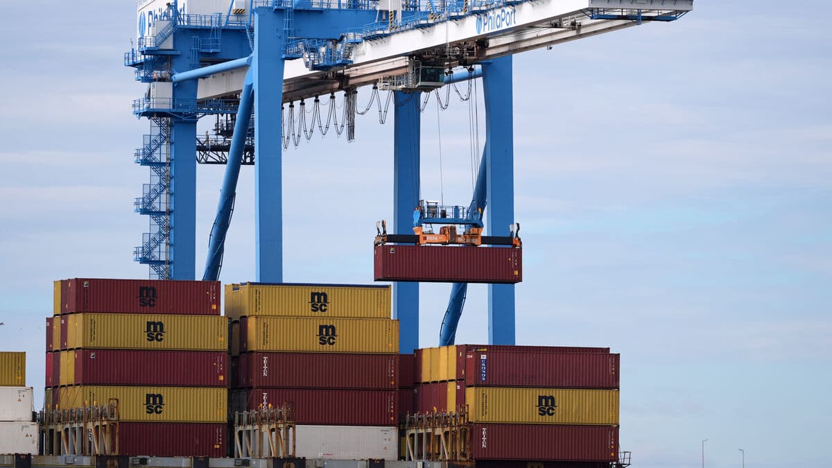 US trade deficit swells again to nearly $57 billion in November