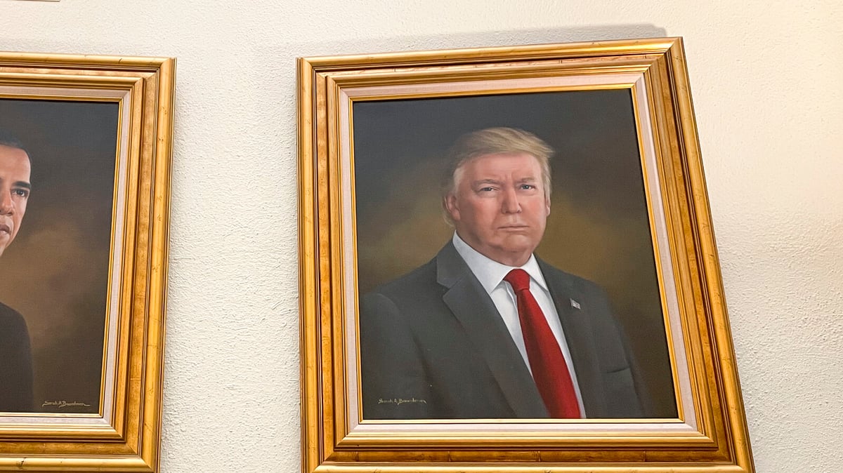 Michael Moore Collects Over 1000 Trump Portraits for Art Exhibition