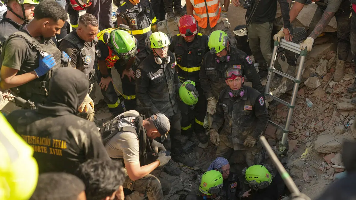 Venezuela earthquake death toll rises to 1,450 as search for survivors continues