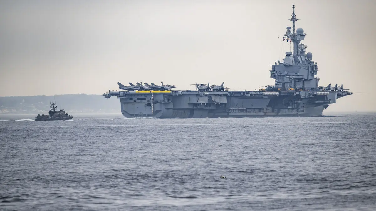 Macron says coalition will reopen and secure shipping lanes in the Persian Gulf and the Red Sea