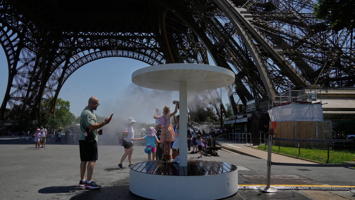 Hottest day ever recorded in France as heatwave closes Eiffel Tower and Louvre early