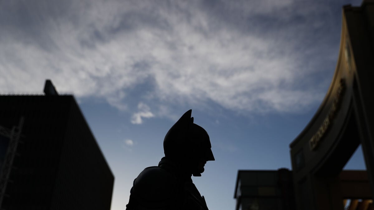 London’s Mystery Batman Pays for Petrol and Fills Potholes, Drawing Nearly 100,000 Instagram Followers