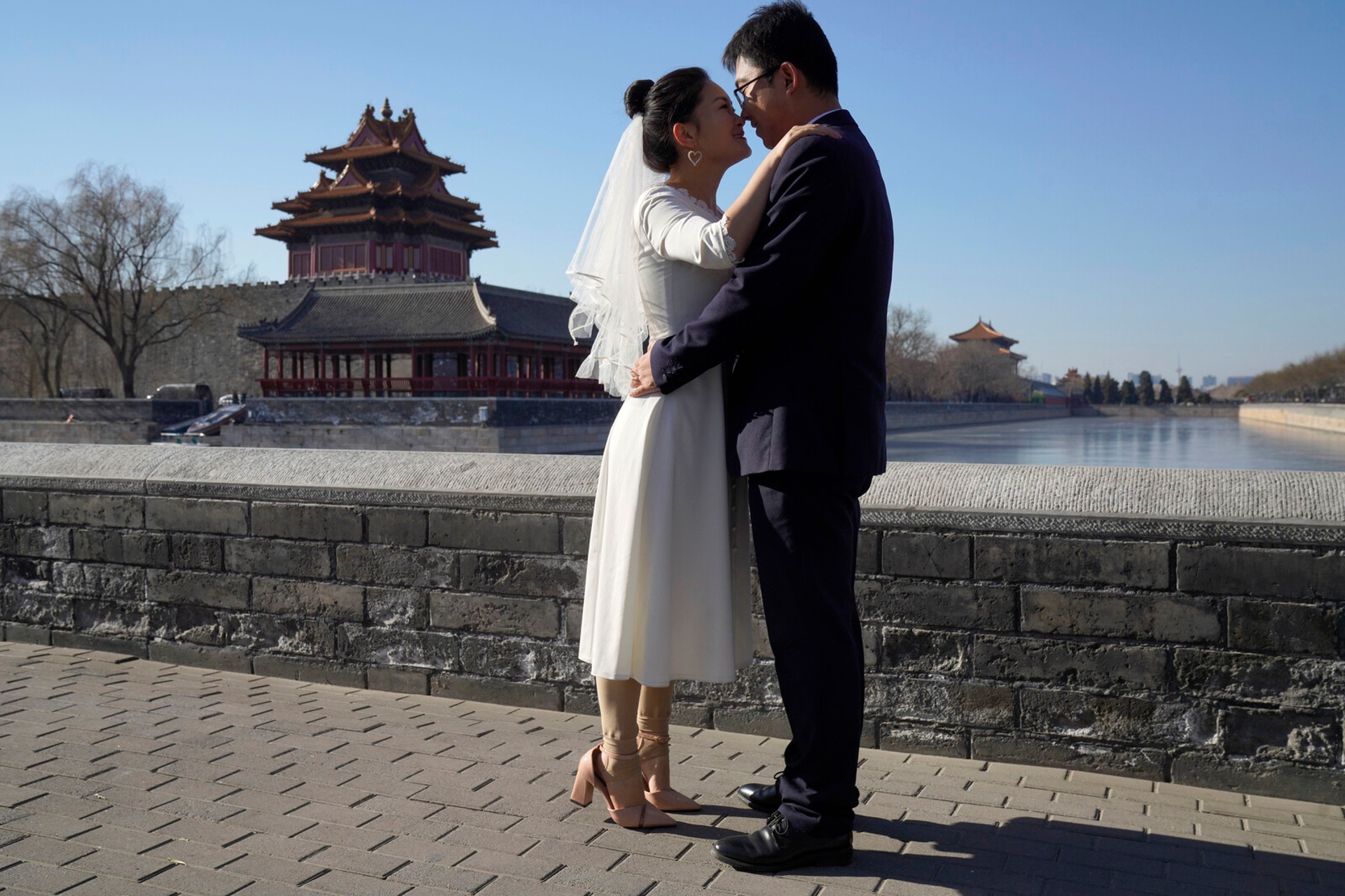 China Eases Marriage Rules to