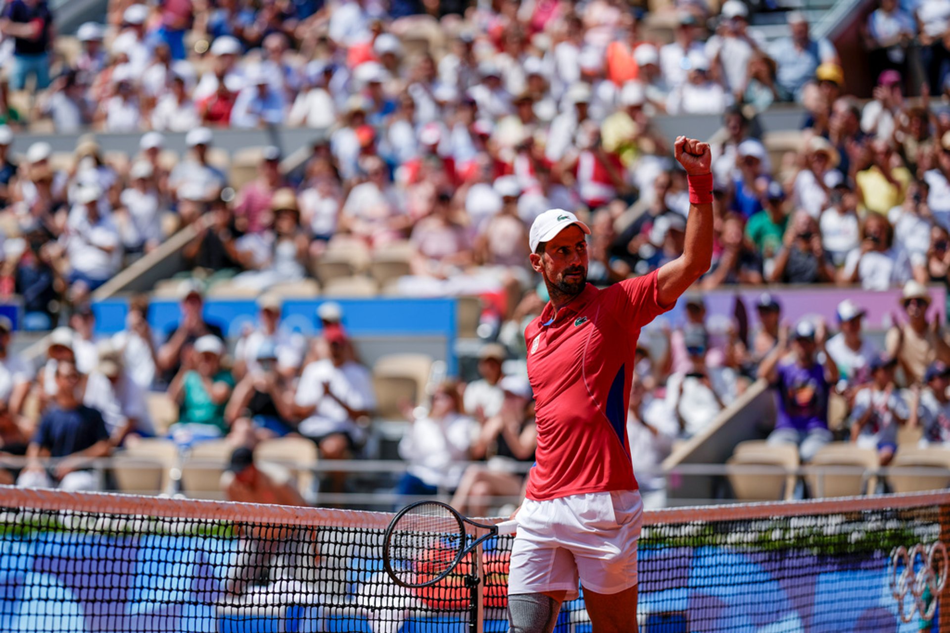 Djokovic into Olympic quarterfinal