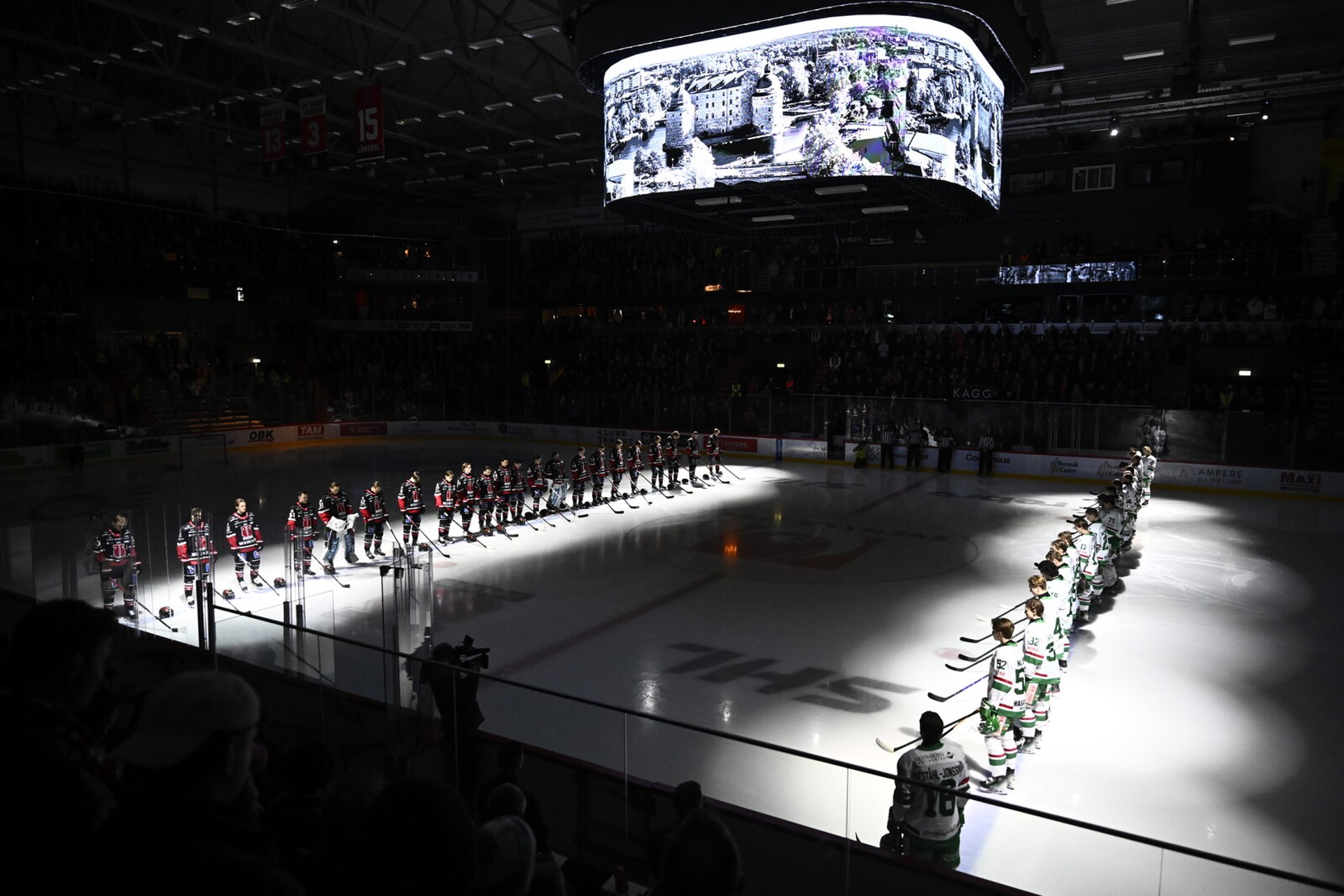 "Victims Honored Before Face-Off: 'Stand United'"