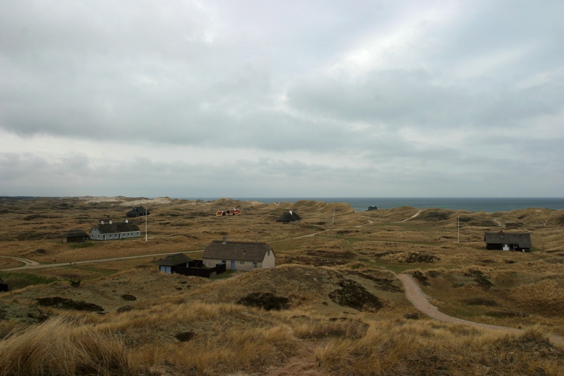 Two boys buried under sand in Denmark