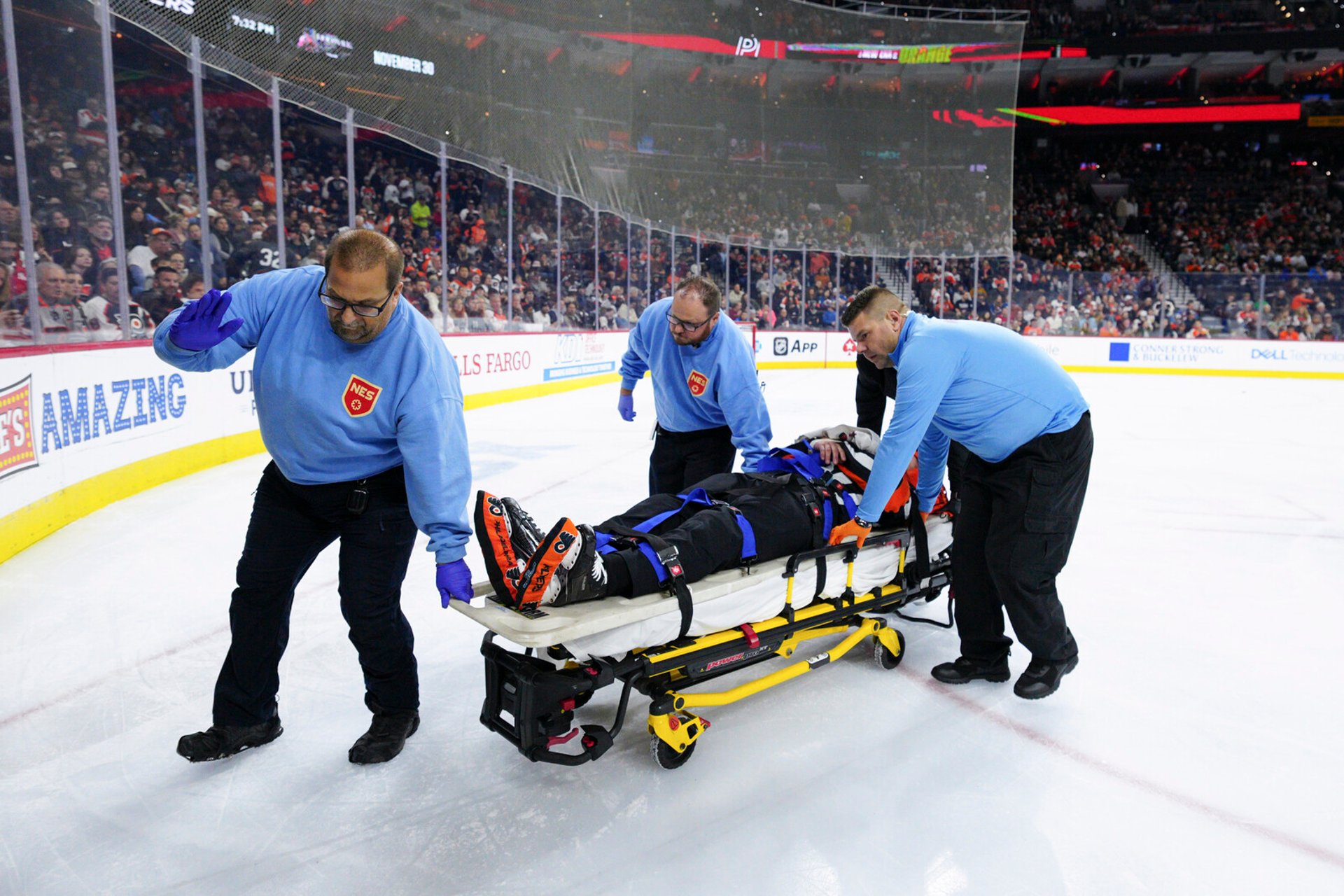 NHL Referee Carried Out on Stretcher After Collision