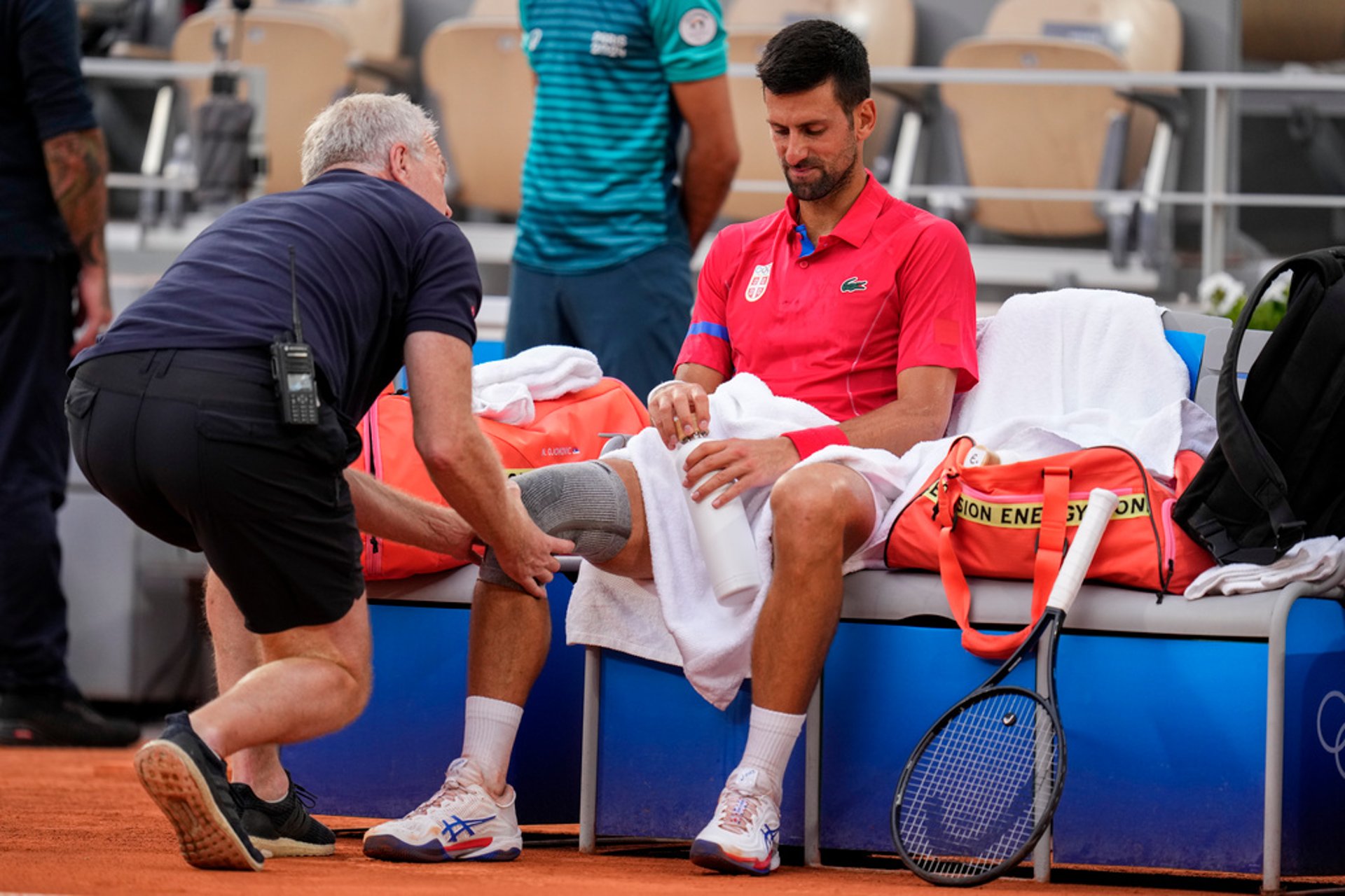 Injured Djokovic "hopes for the best"