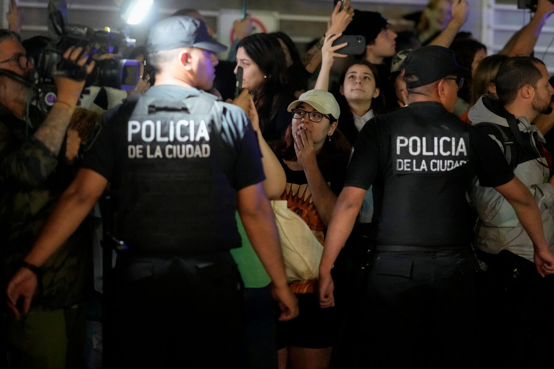 Shocked fans gather outside Payne's hotel