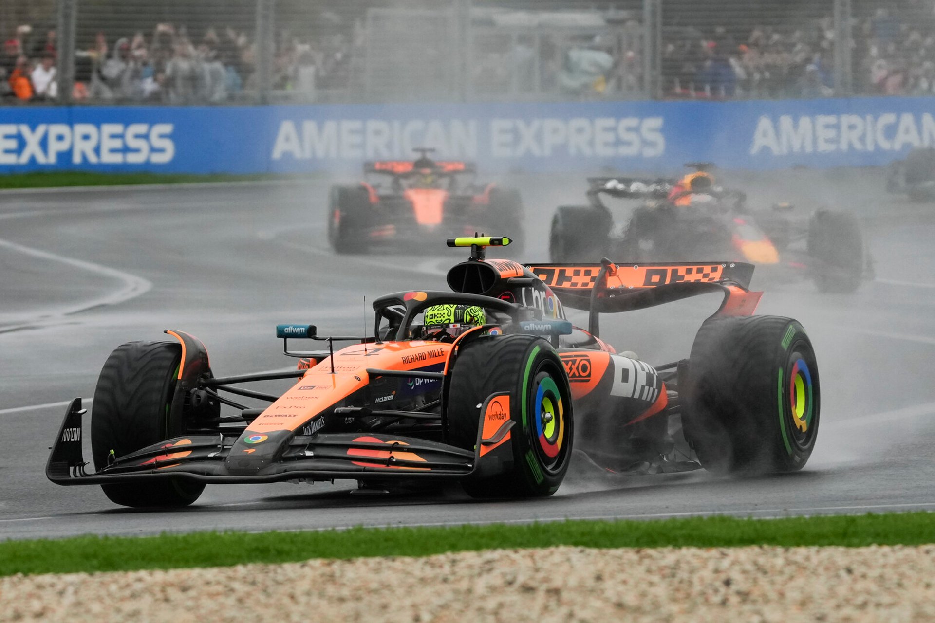 Norris wins chaotic and wet F1 premiere