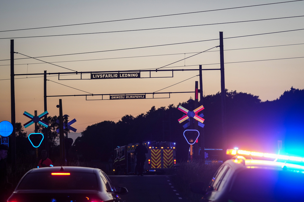 Car hit by train – woman dead