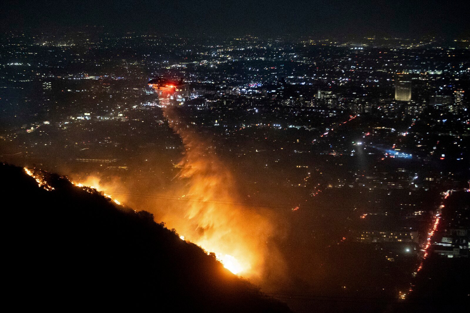 Fires stop NBA basketball in