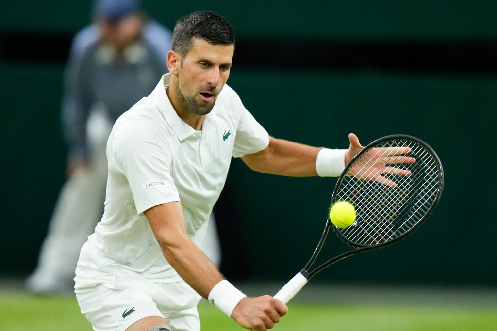 Djokovic through to semi - faces Italian