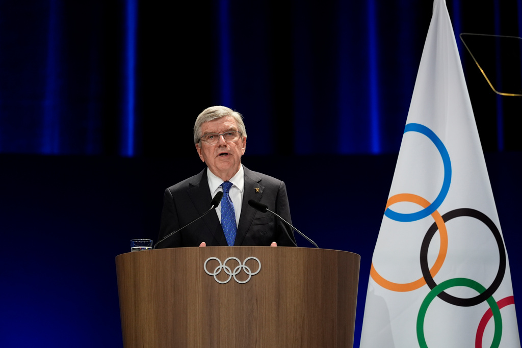 The announcement: IOC chief steps down next year