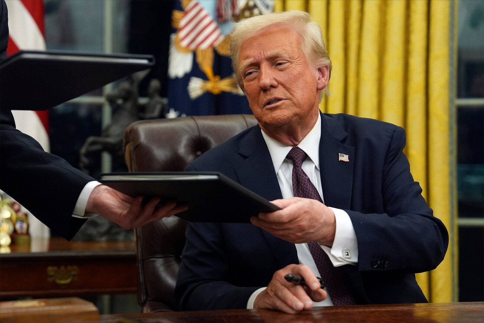 Trump pardons convicted individuals for storming of the Capitol