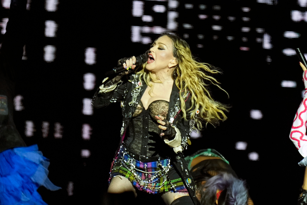 Delayed Madonna is sued – again