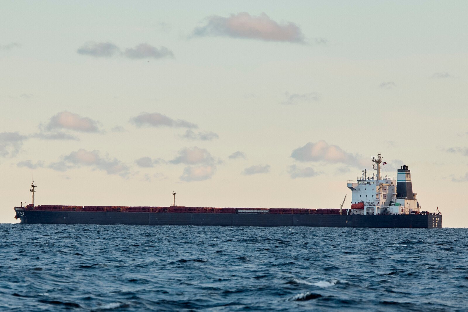 Task: Chinese ship dropped anchor along the bottom