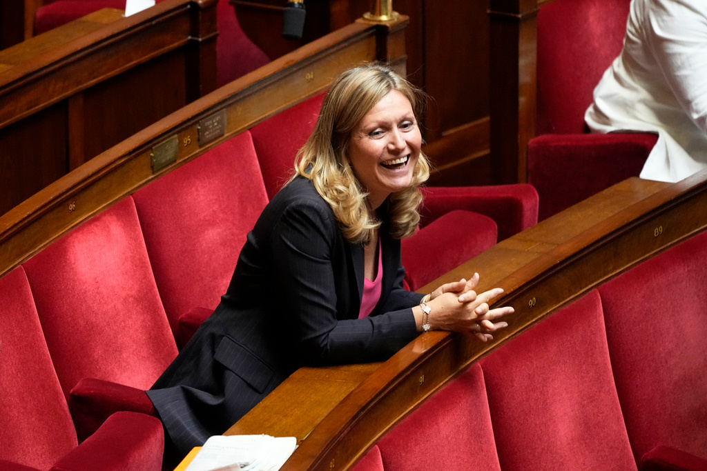 Speaker re-elected in turbulent French parliament