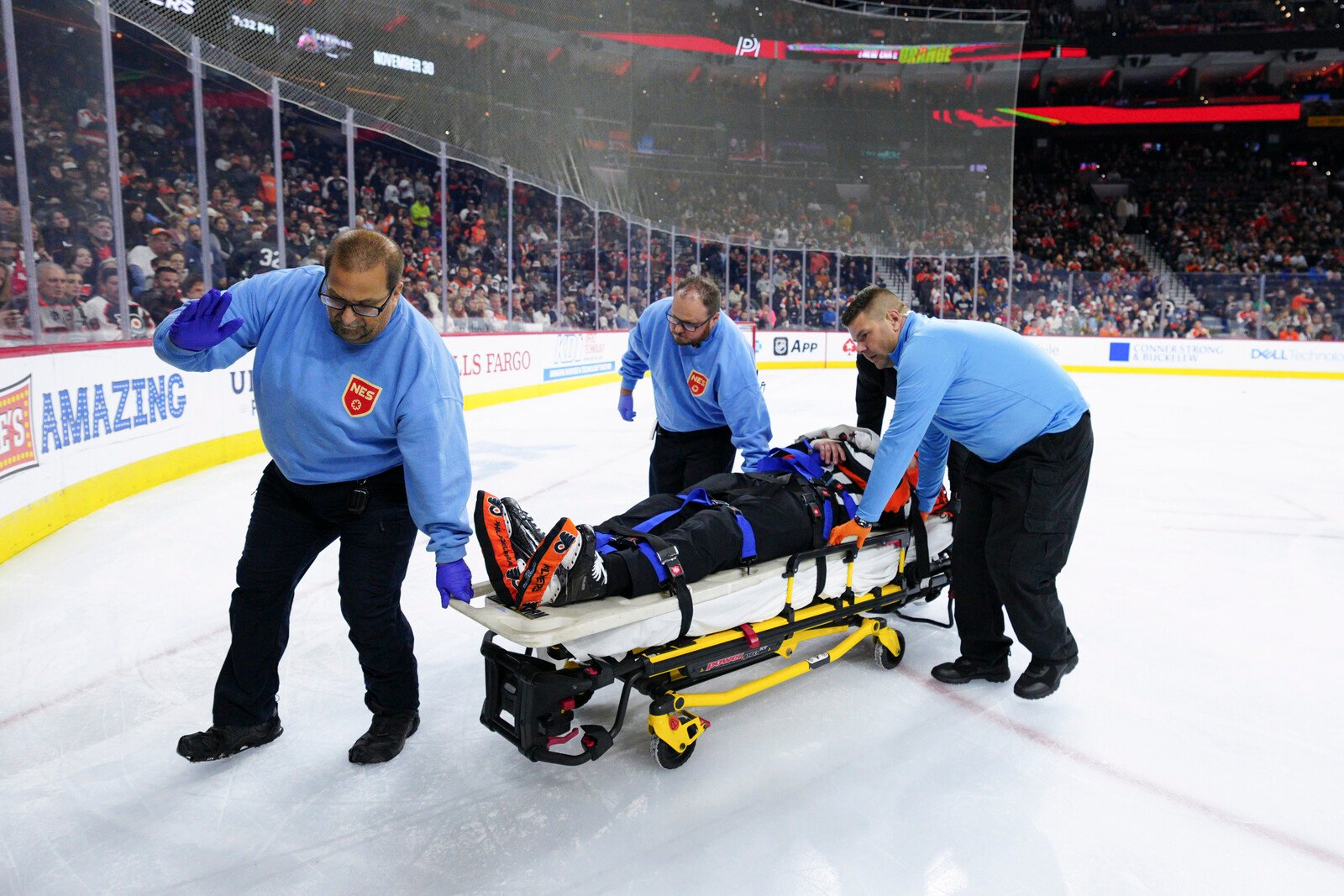 NHL Referee Carried Out on Stretcher After Collision