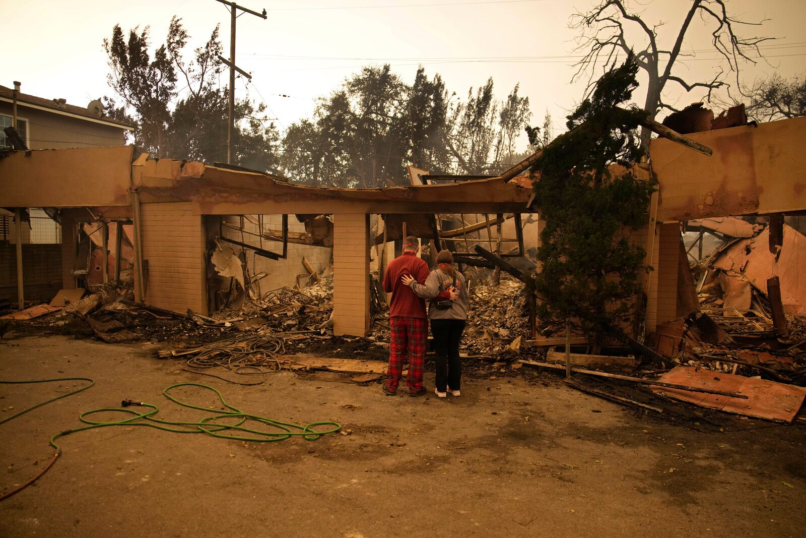 Seven dead and thousands of homes destroyed in the fires