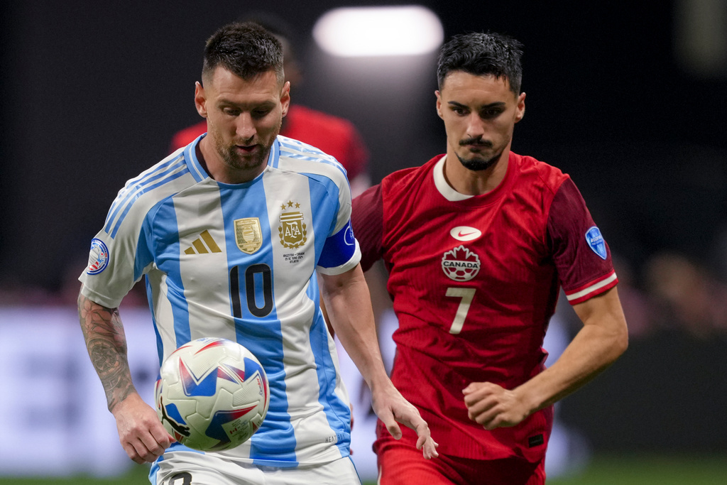 <p>Argentina<|start_header_id|> assistant referee eventually gave Argentina a free kick after a foul on Canada's Scott Arfield